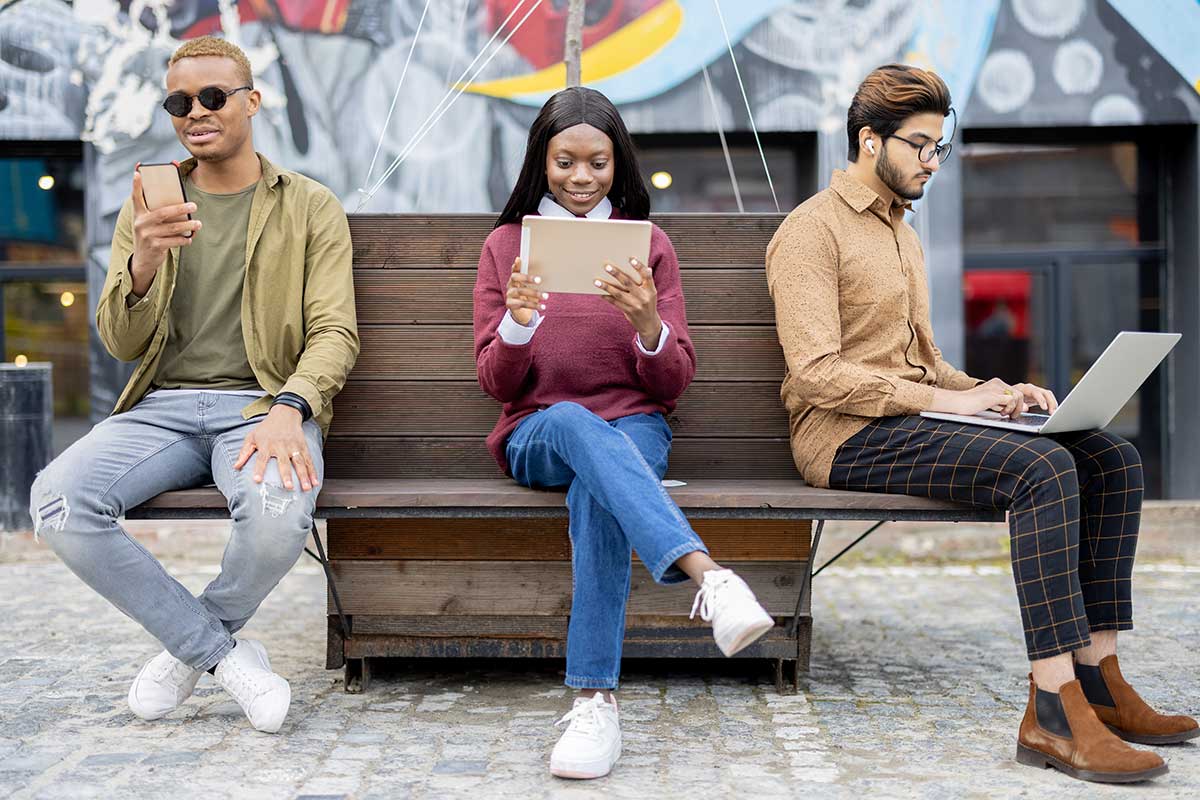 three people on bench